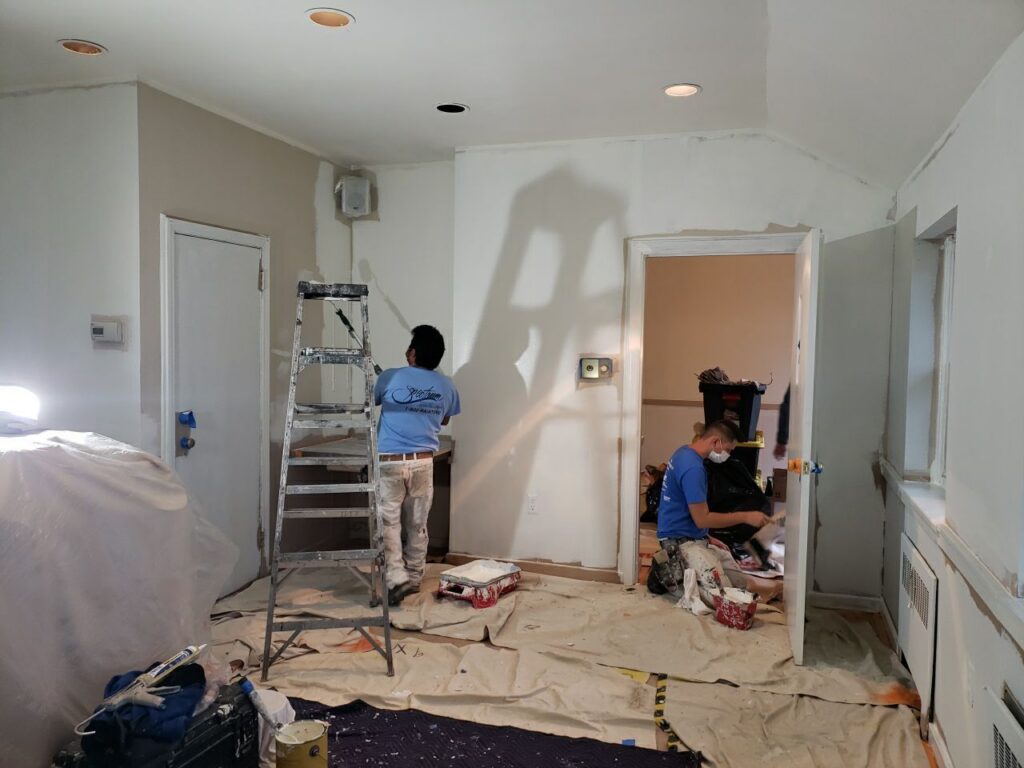 Professional painters doing painting